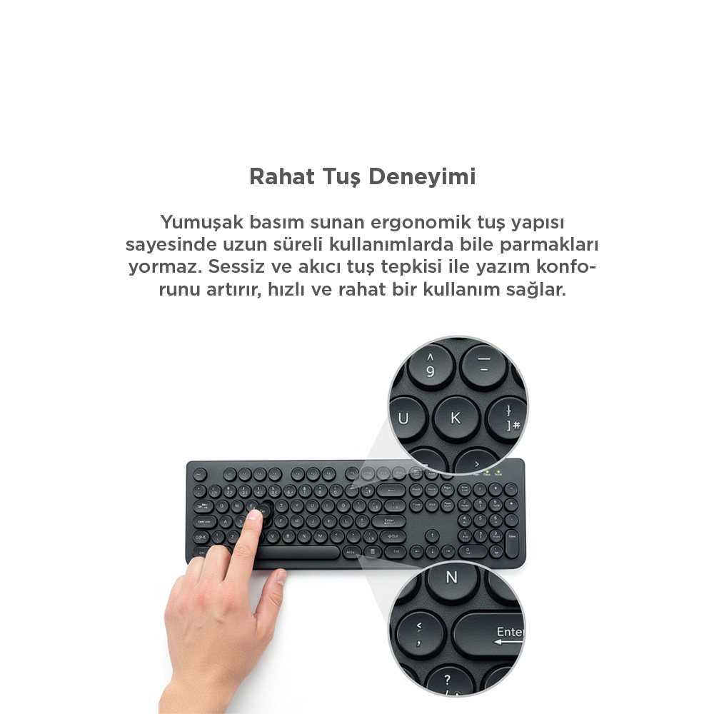 Yuvarlak tuşlu siyah klavyeyi bir el kullanıyor. Yakın çekimler tuşları gösteriyor.