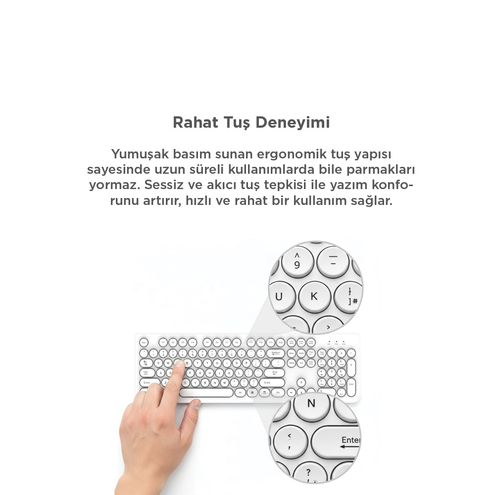 Bir elin boşluk tuşuna bastığı beyaz klavye. Yakın çekimler tuşları gösteriyor.