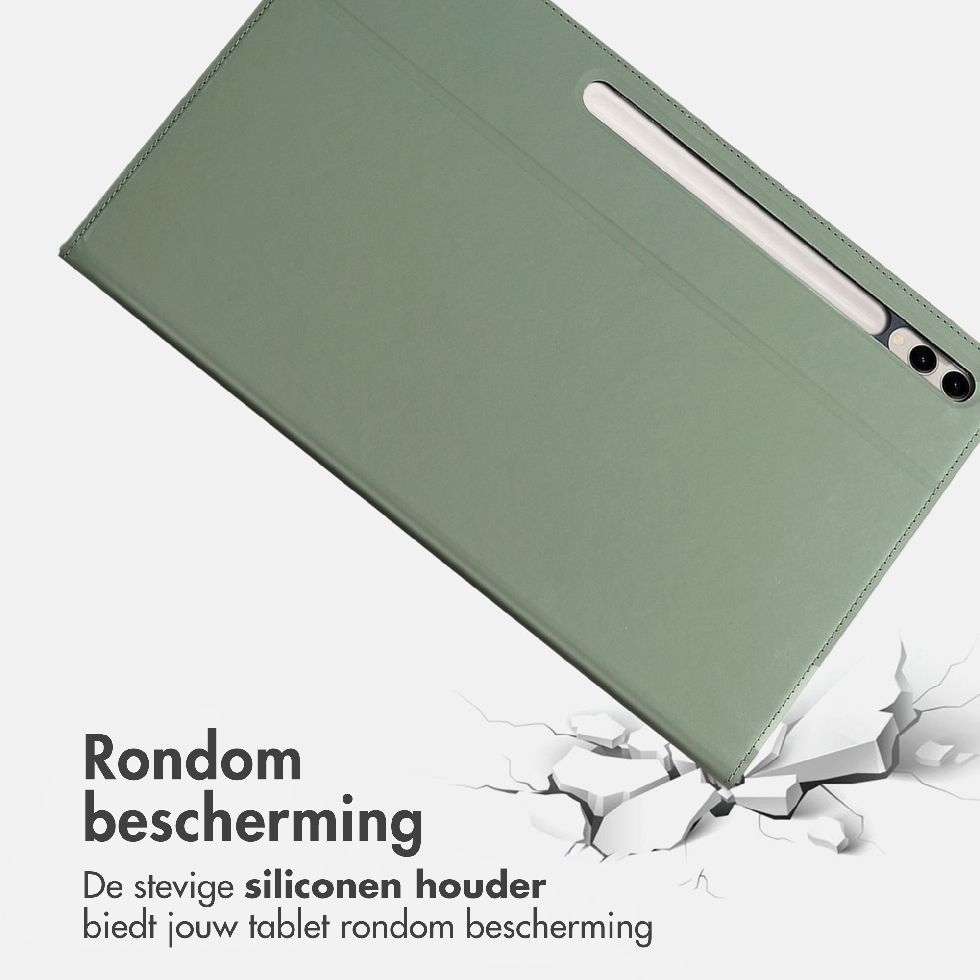 Groene tablethoes met penhouder, liggend op gebarsten ondergrond.
