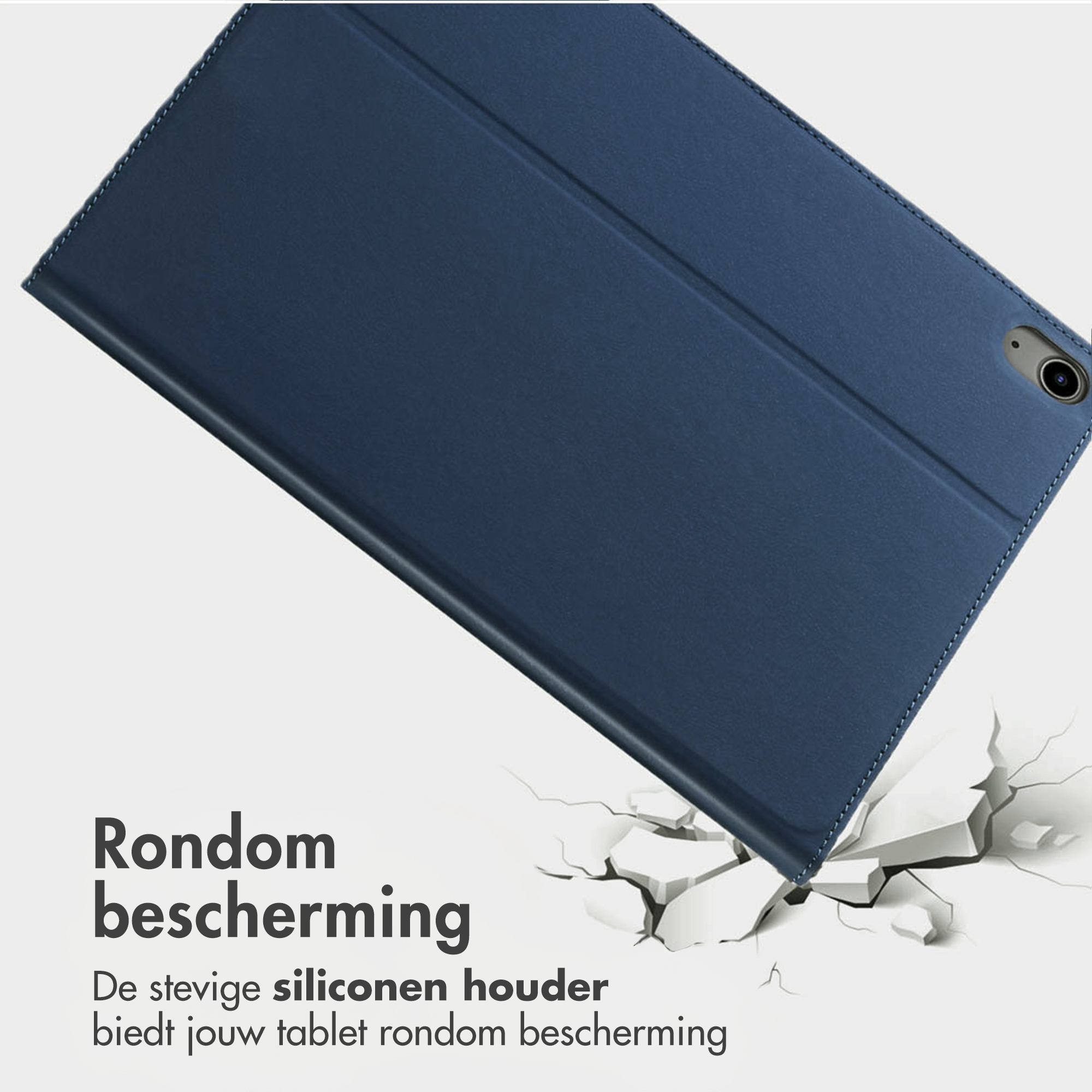 Donkerblauwe tablethoes met gestikte rand, op gebroken wit.