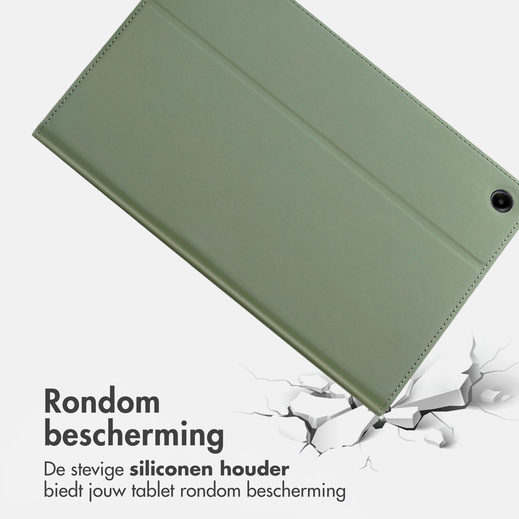 Green tablet case with stitching lying on cracked ground.