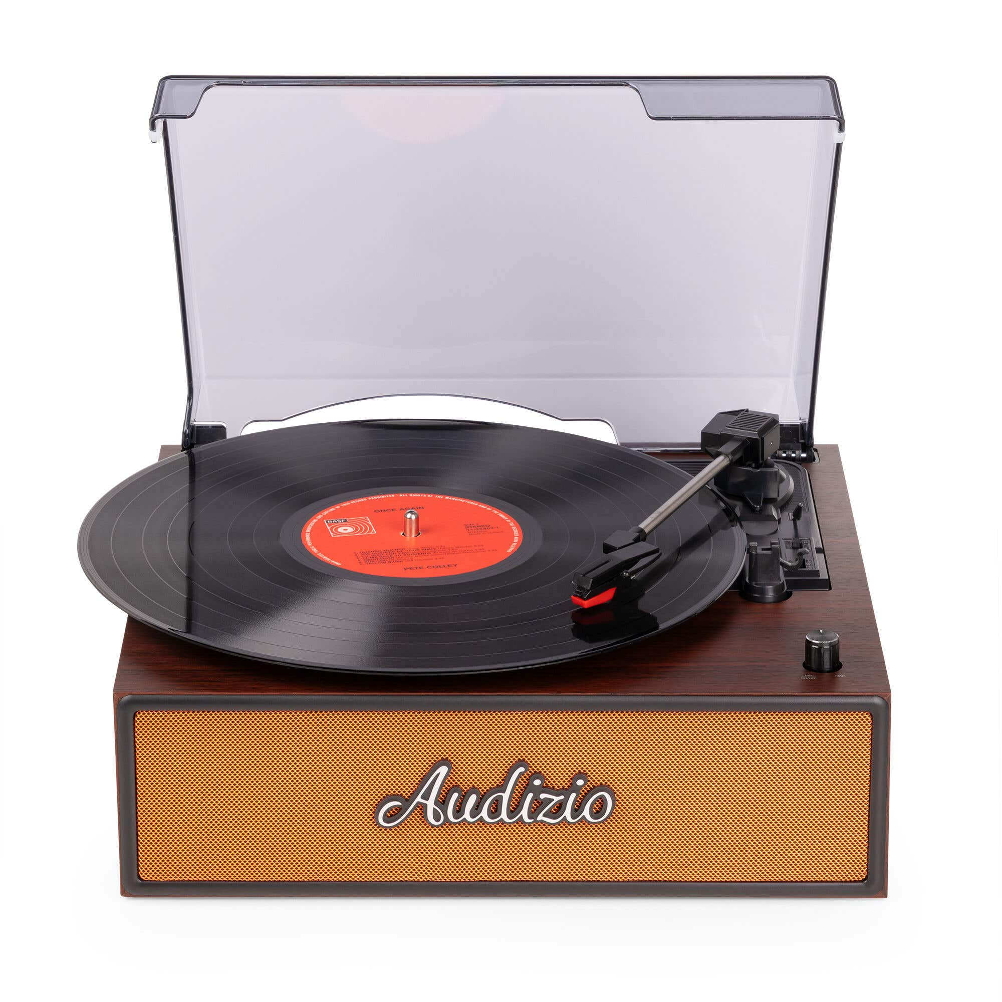 Un tocadiscos con la tapa abierta, reproduciendo un disco de vinilo negro con aguja roja.