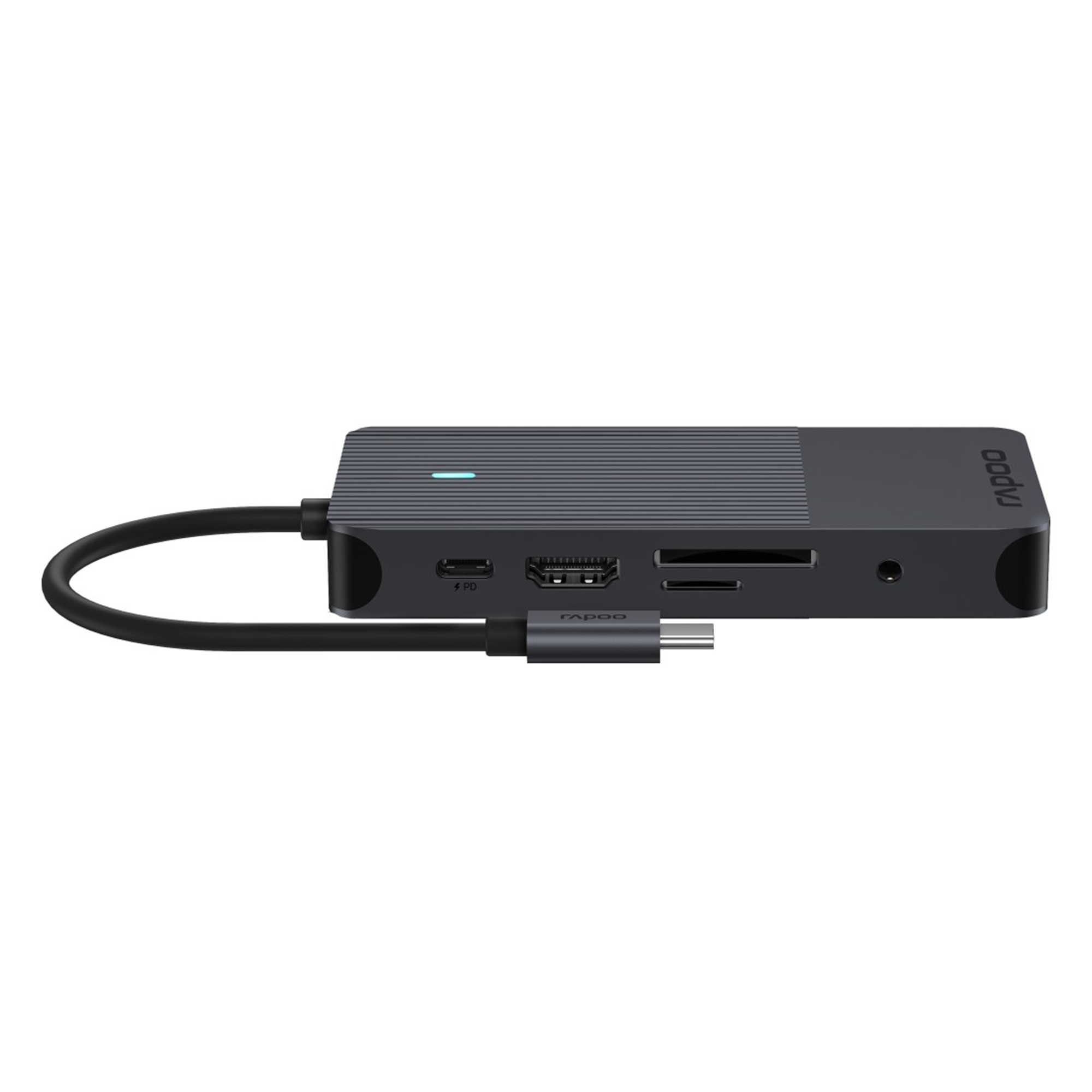 Un concentrador USB-C gris con puertos: USB-C PD, HDMI, tarjeta SD y audio.