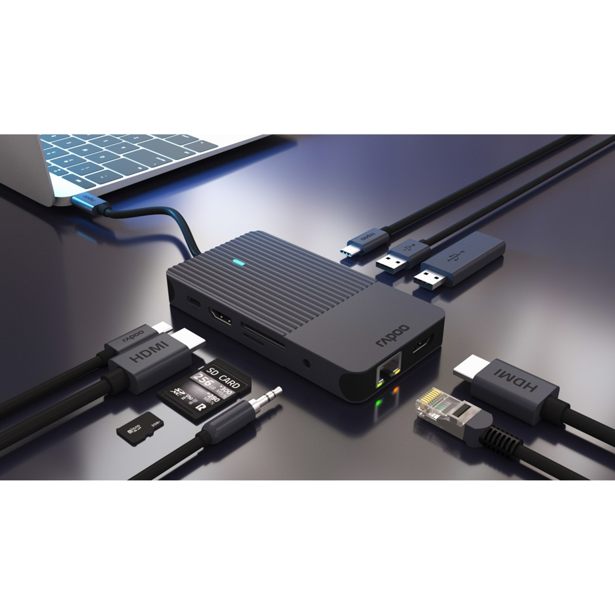 Un portátil negro se conecta a un hub de acoplamiento con puertos HDMI, USB y de tarjeta SD.