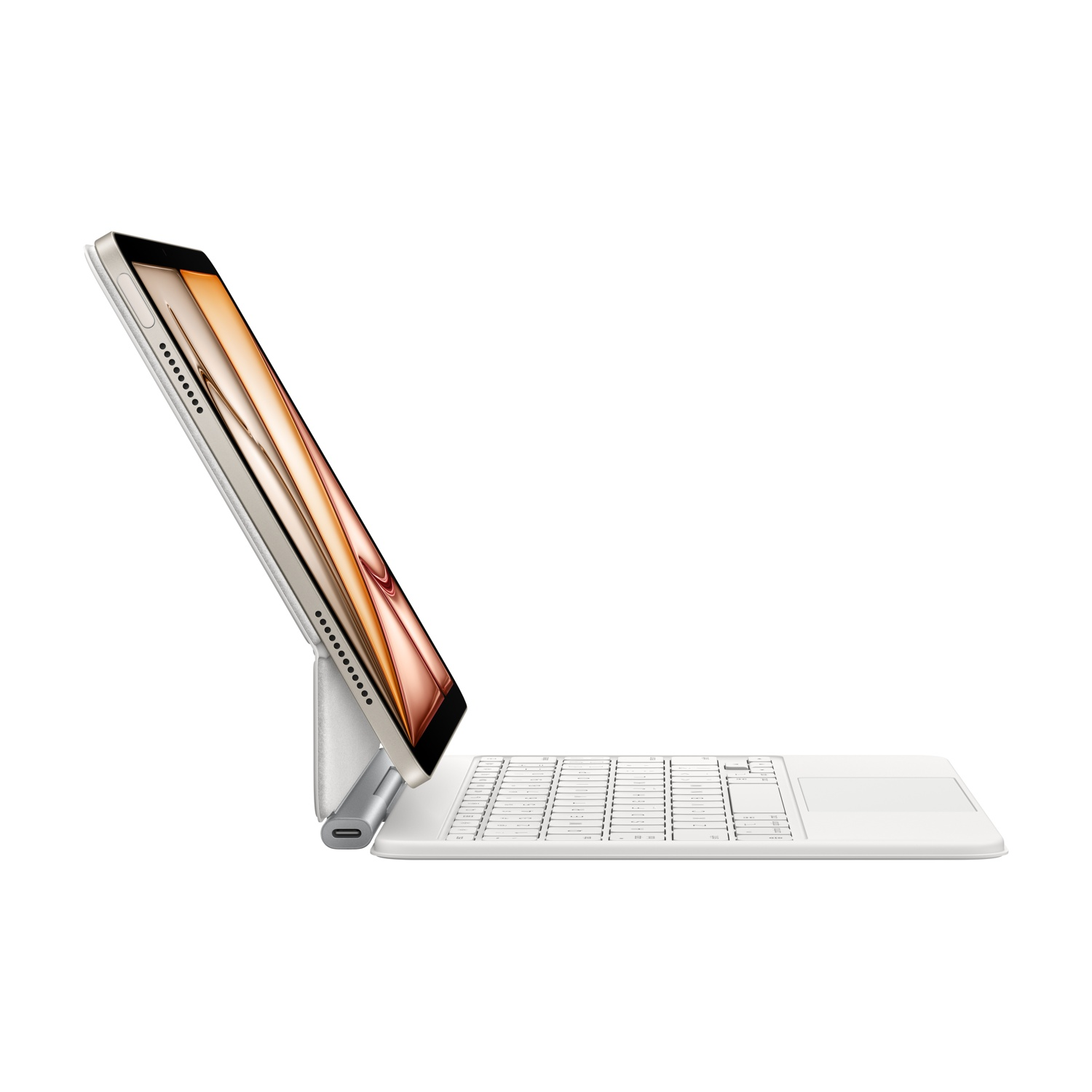 Un tablet argentato con tastiera e trackpad bianchi, su sfondo bianco.