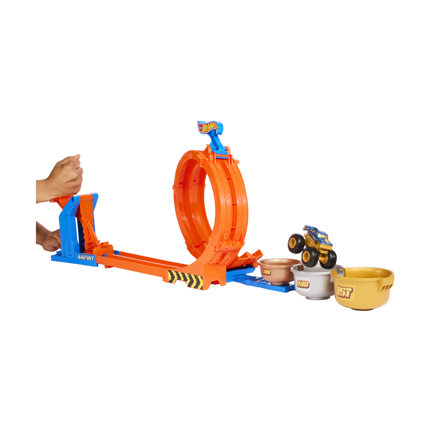 Ein Hot Wheels Monster Truck Spielset mit Looping, Rampe und drei Auffangschalen.