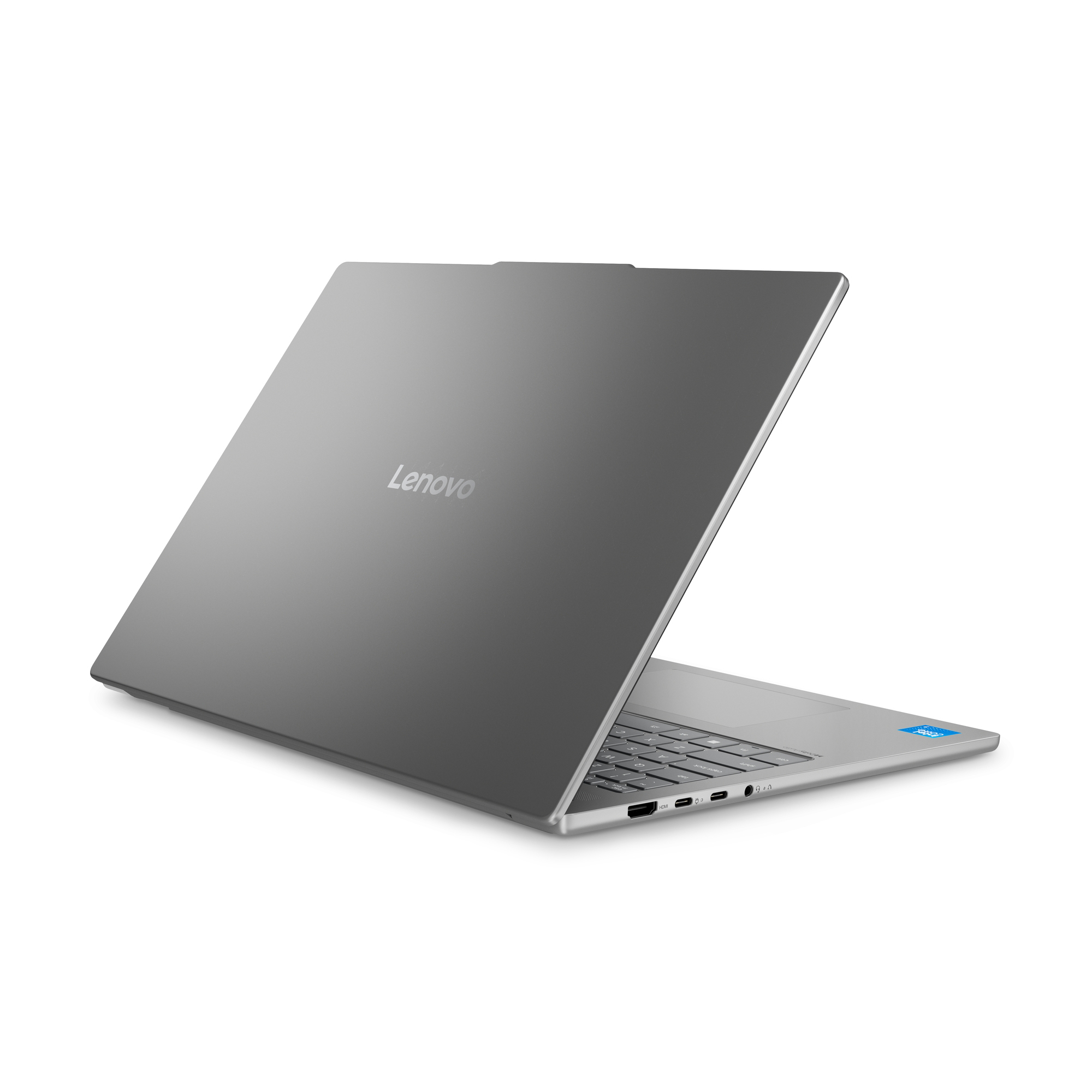 Un laptop Lenovo grigio chiuso con tasti e porte argentate visibili.