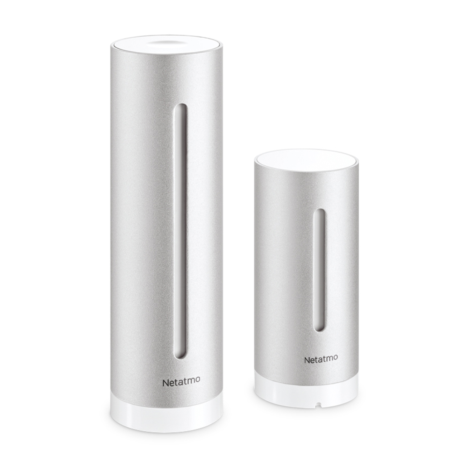 Two silver cylinders with white tops and bottoms stand side-by-side.