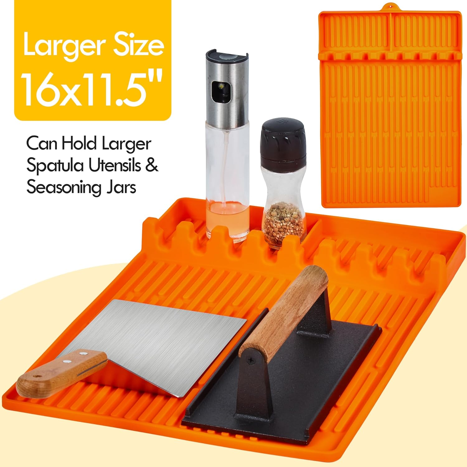 Orange Utensilienablage mit Spatel, Presse, Ölsprüher und Gewürzgläsern. Große Größe.
