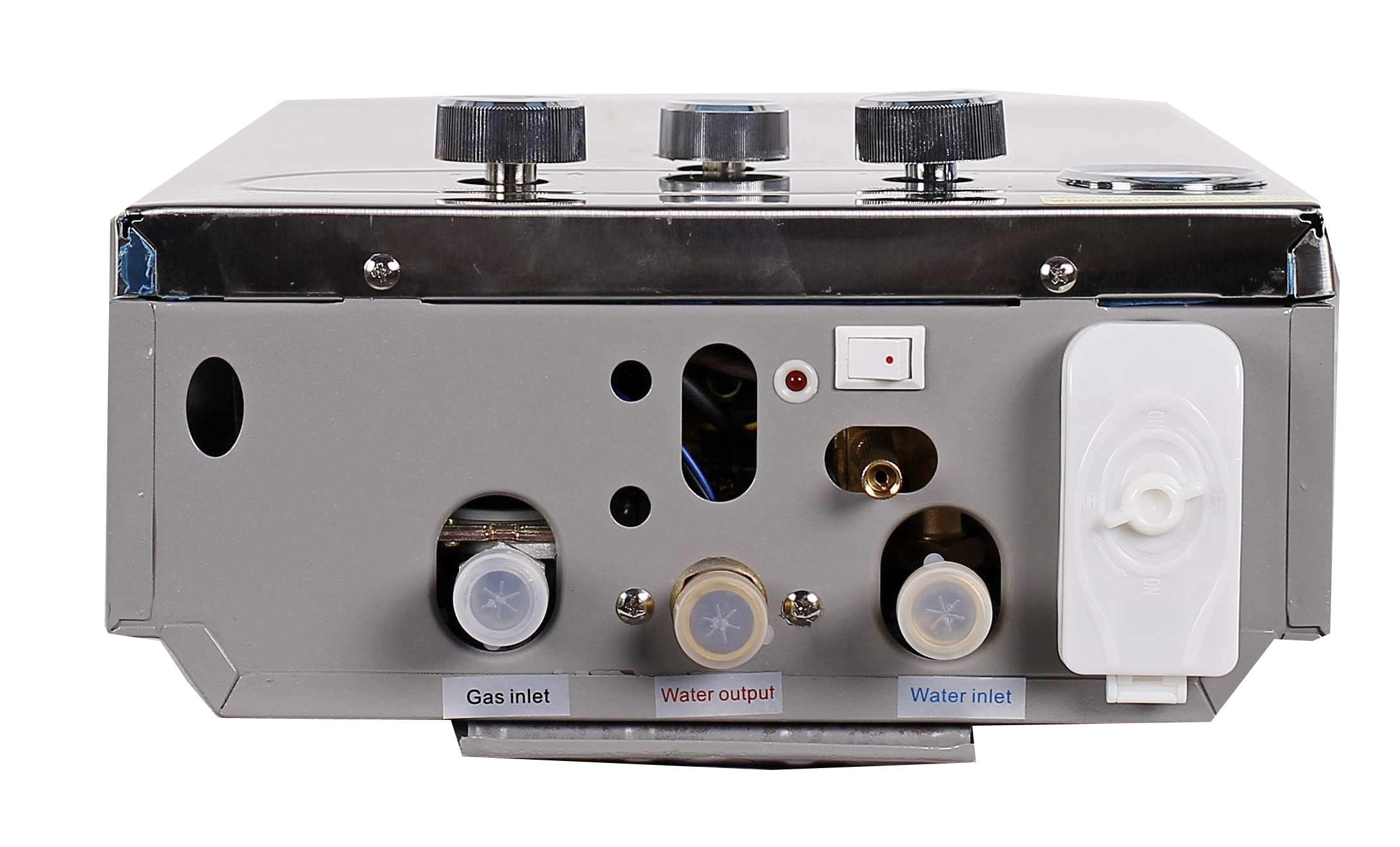 Tył podgrzewacza gazowego z przyłączami gazu, wody i odpływu.