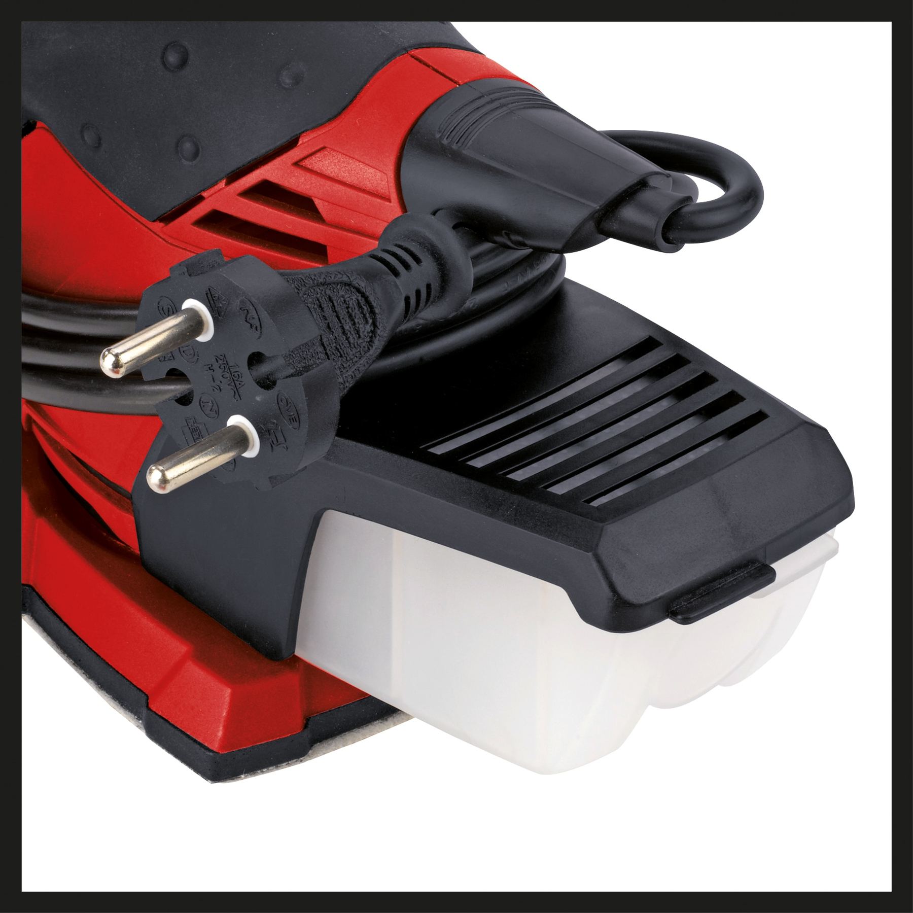 Roter und schwarzer Schleifblock mit Kabel und Stecker.