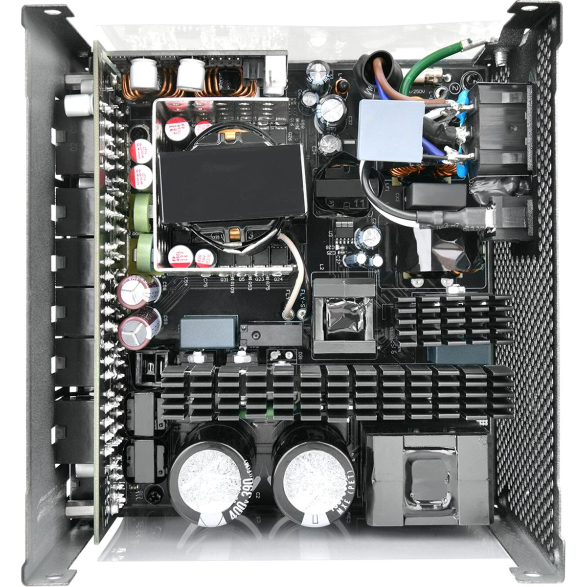 Ein Computer-Netzteil mit vielen Komponenten, Kondensatoren und Kühlkörpern auf einer Platine.