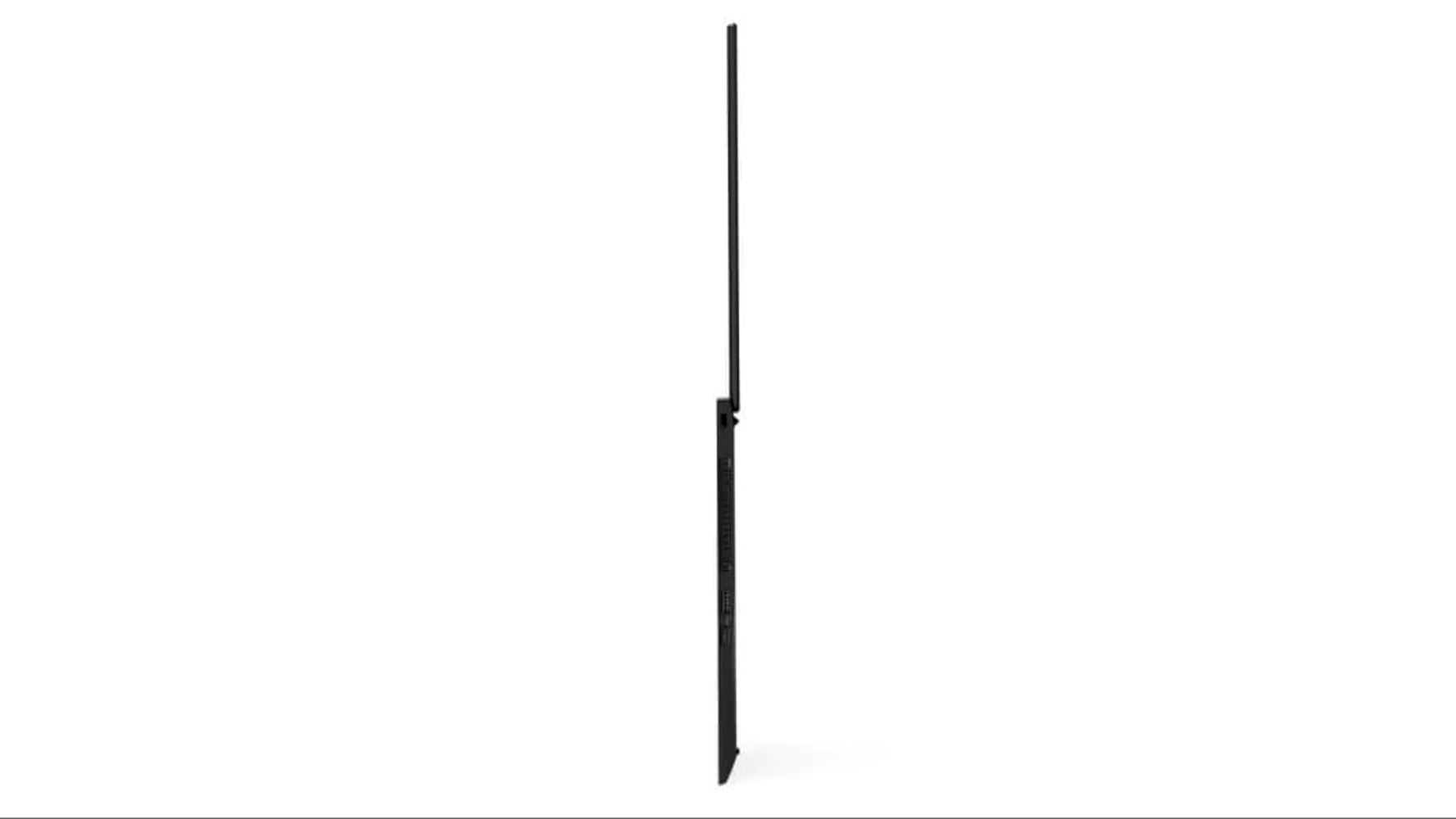 Zamknięty czarny laptop w profilu na białym tle.