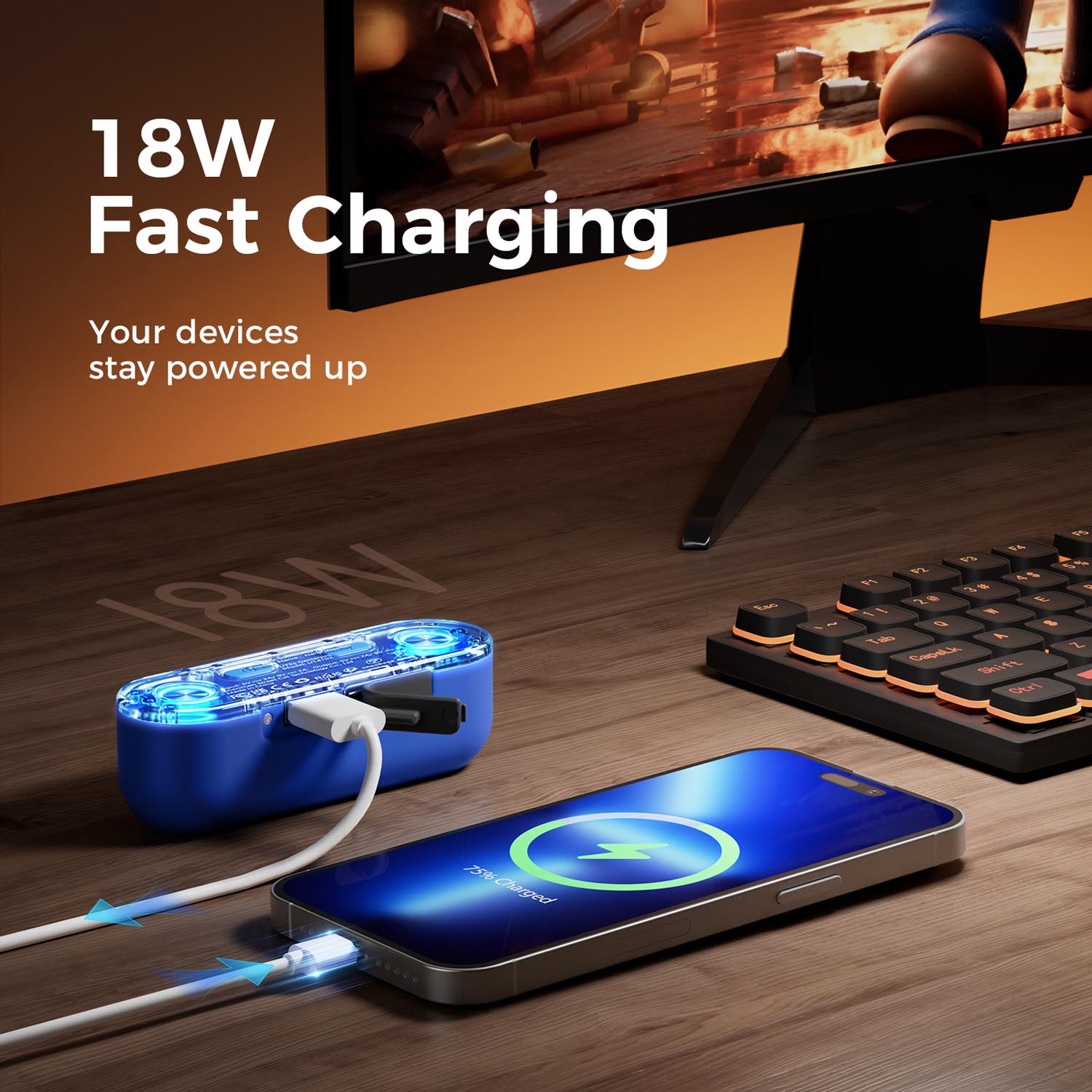 Niebieska ładowarka ładuje iPhone na 75%. Obok znajduje się klawiatura.