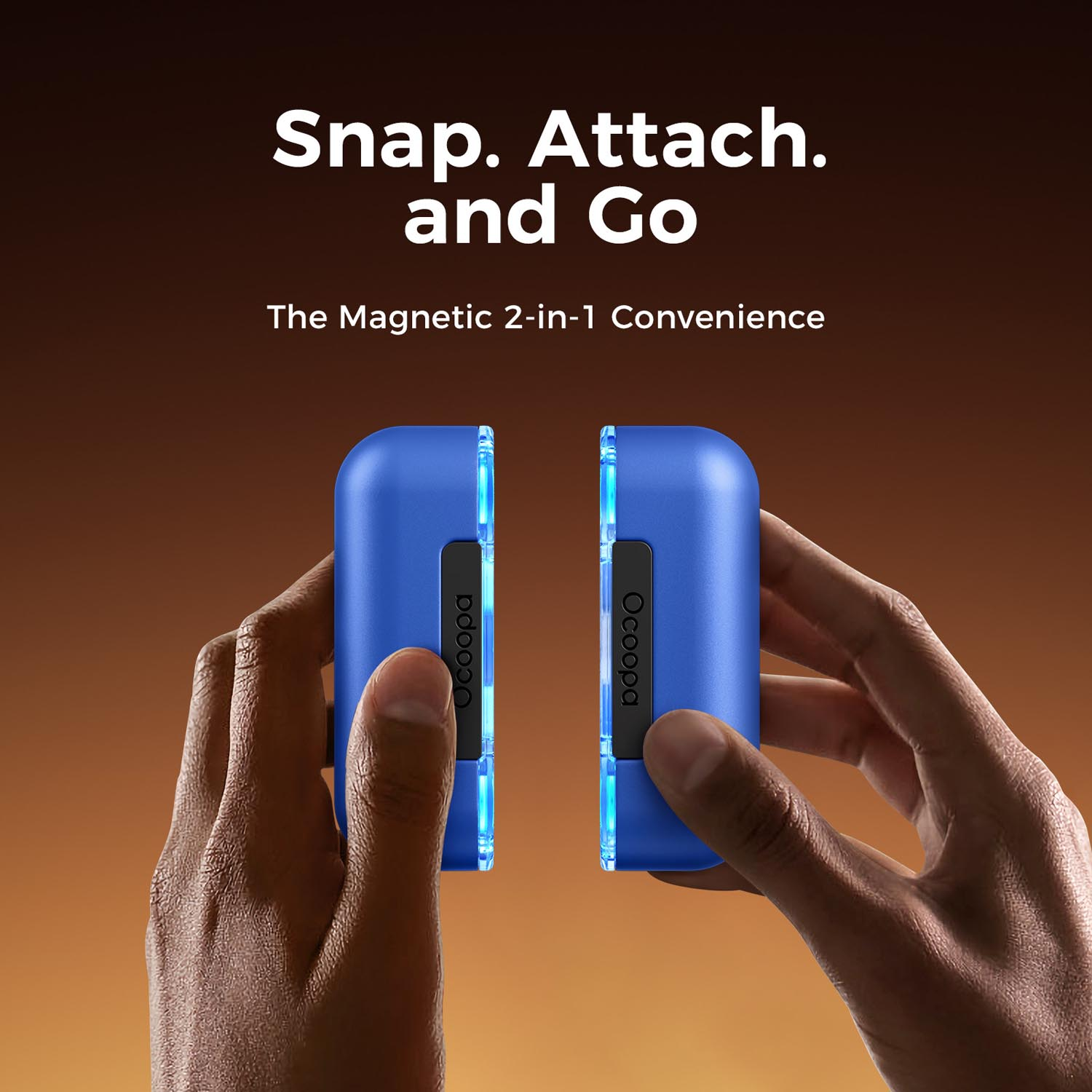 Dwa niebieskie, magnetyczne urządzenia 2 w 1 z podświetlanymi paskami trzymane przez ręce.