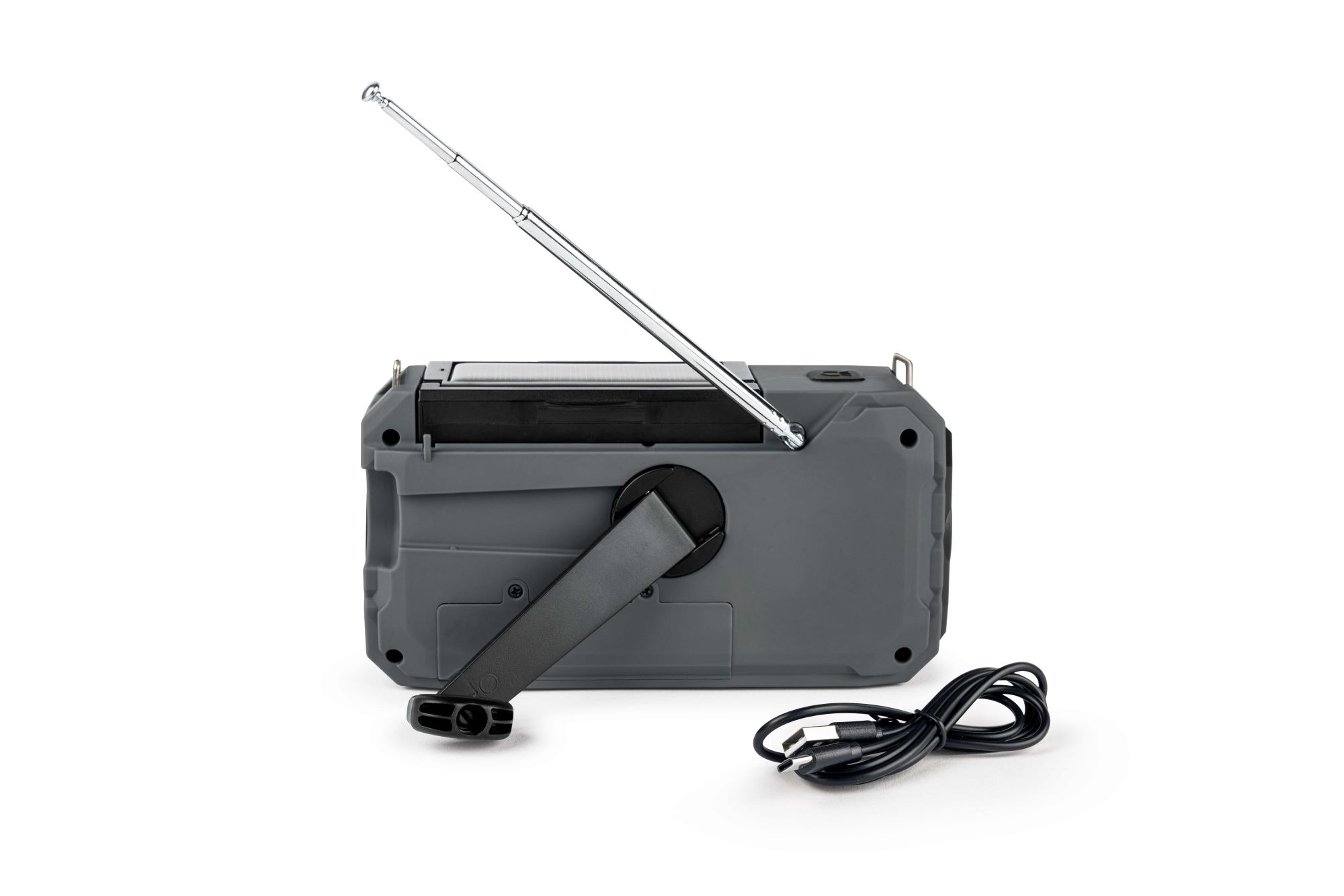 Szare radio na korbkę z wysuniętą anteną i obok kablem USB.