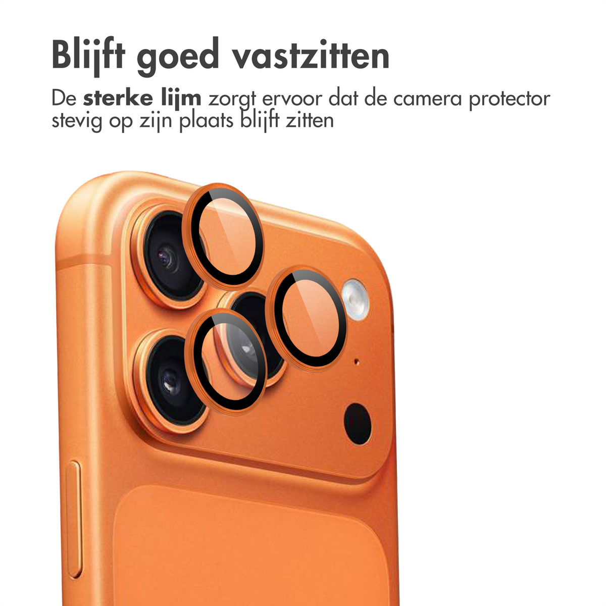 Oranje telefoon met camera lens protector stickers. Close-up van de camera.