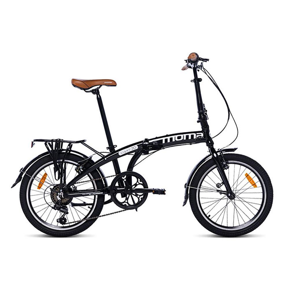 Una bicicletta pieghevole nera con sella marrone e portapacchi.
