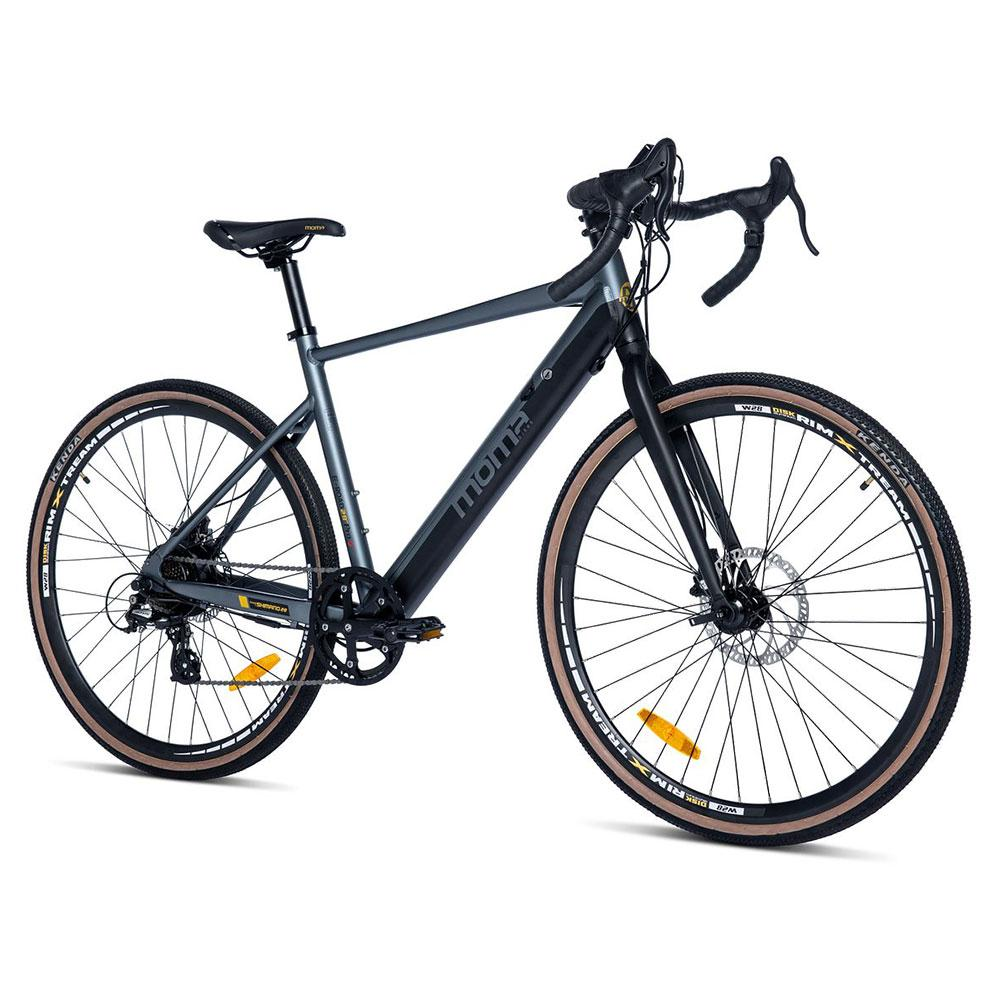 Bicicletta grigia con manubrio da corsa, pneumatici Kenda e freni a disco.