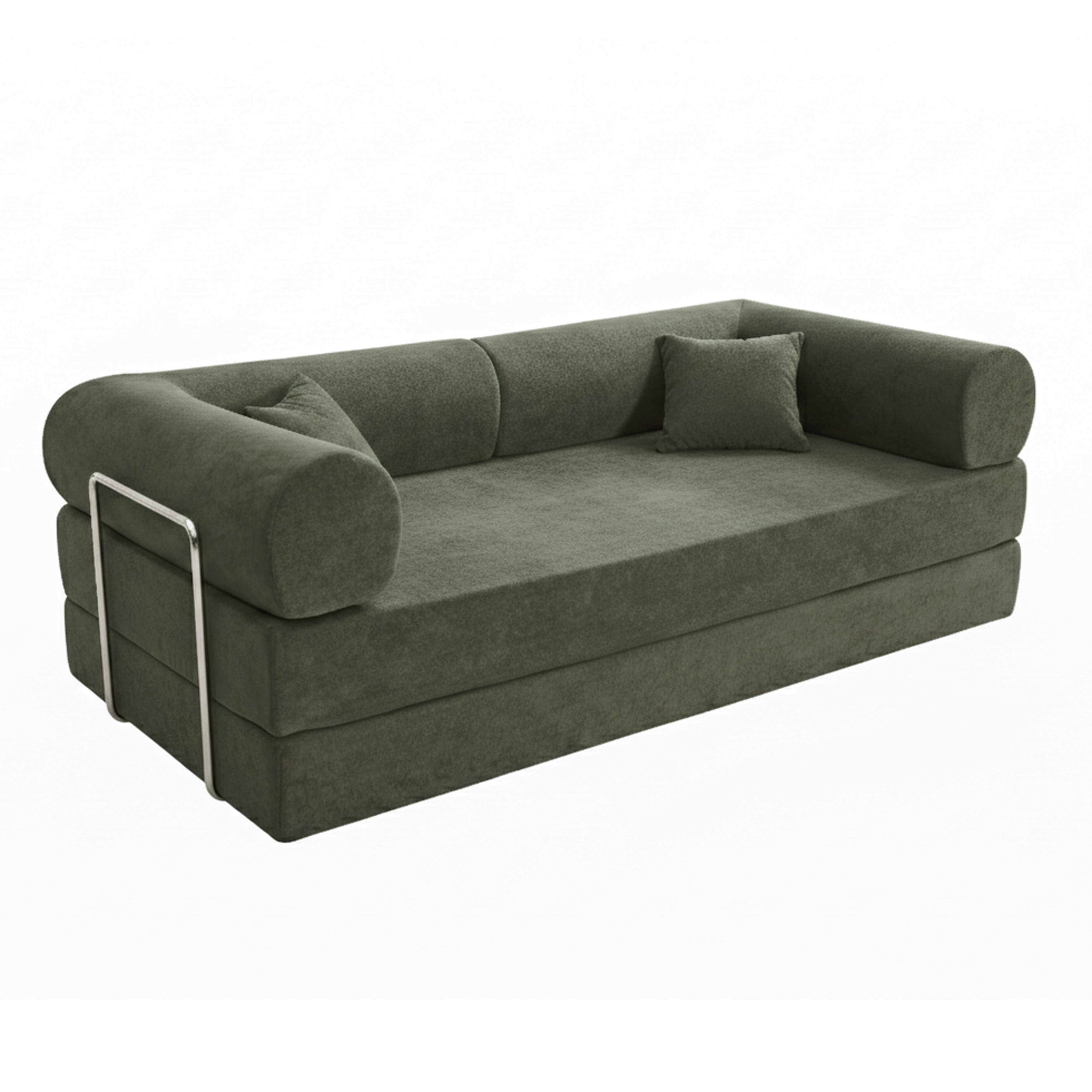 Ein dunkelgrünes Schlafsofa mit zwei Kissen und Metallrahmen.