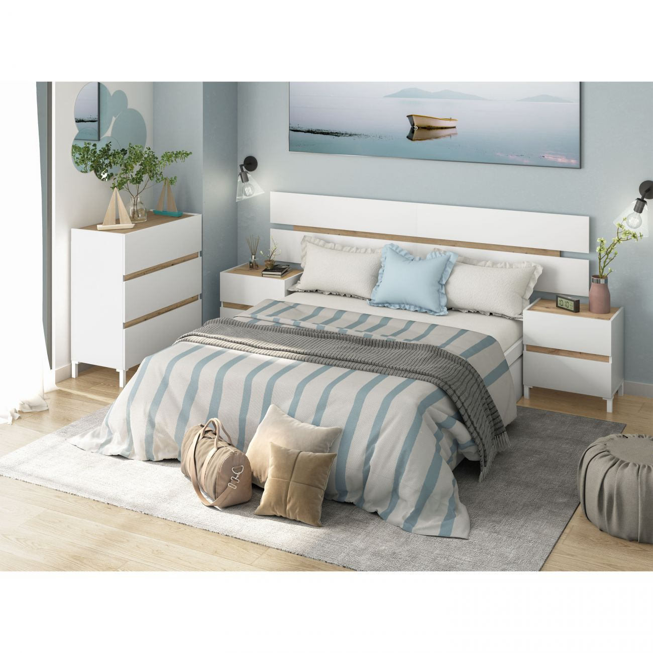 Un dormitorio moderno con cama blanca y ropa de cama a rayas azules.
