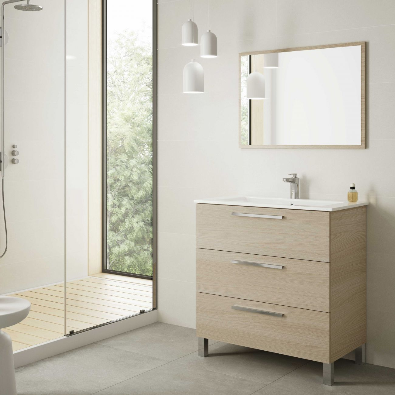 Baño moderno con ducha, lavabo y espejo. Colores claros.