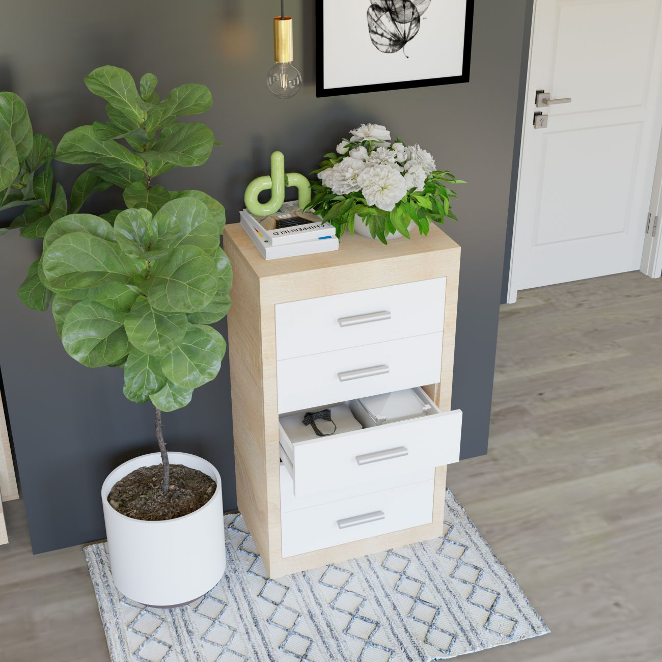 Una cómoda blanca pequeña con un cajón abierto, junto a una planta grande.