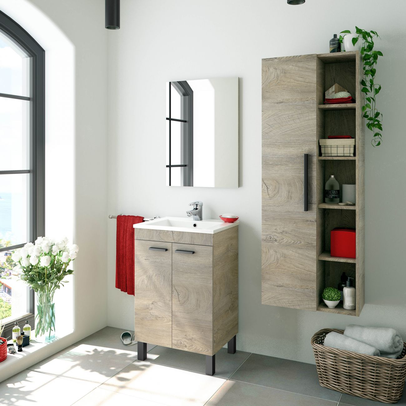 Un baño con tocador de madera, espejo, estante y ventana grande.