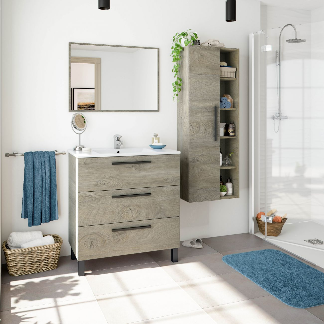 Un baño moderno con mueble de lavabo, espejo, armario y ducha.