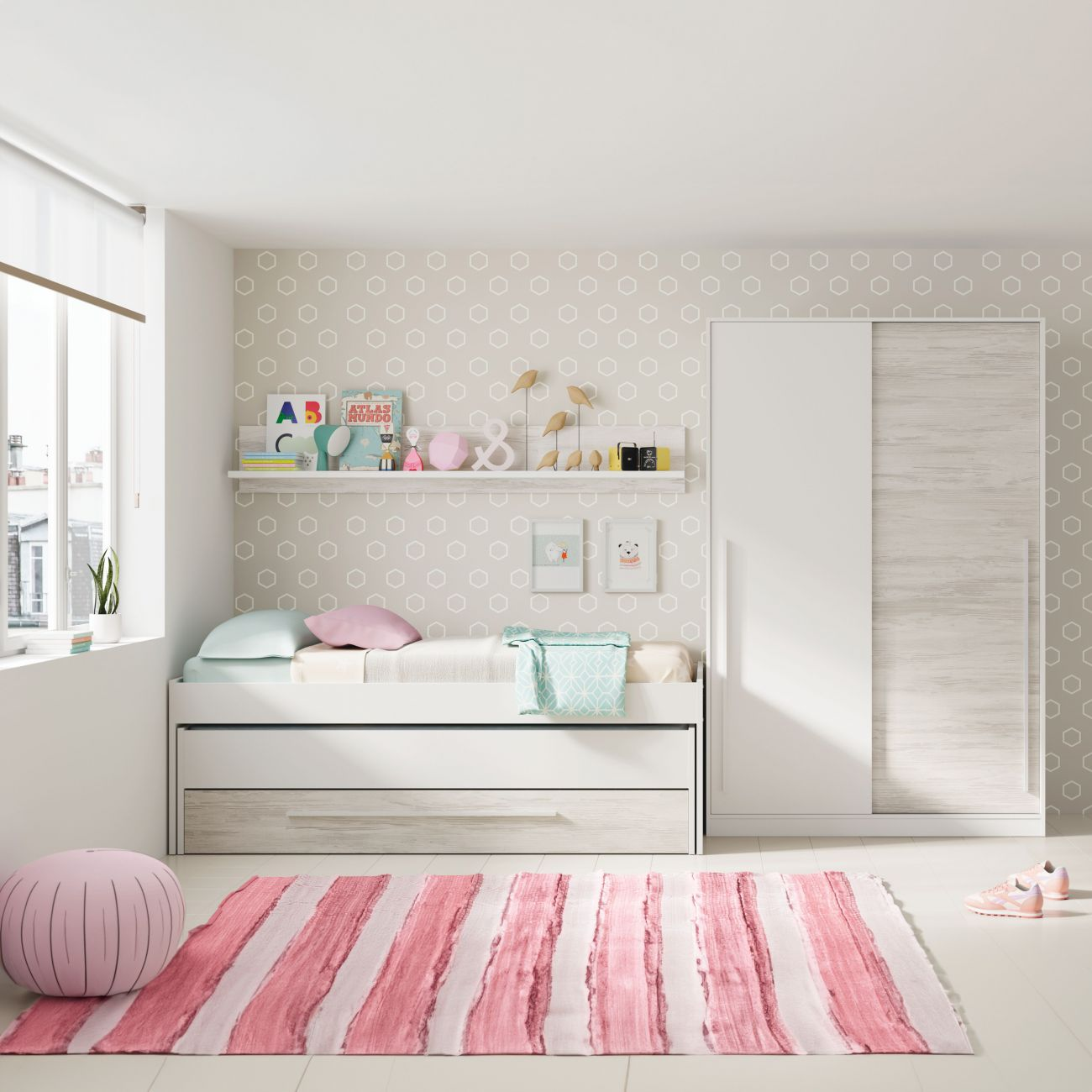 Dormitorio infantil con cama blanca, alfombra rosa y armario blanco.