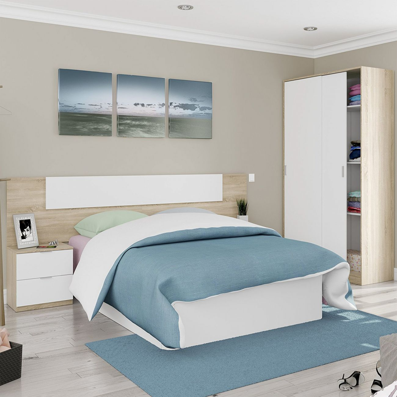 Dormitorio moderno con cama, mesita de noche, armario y tres cuadros.