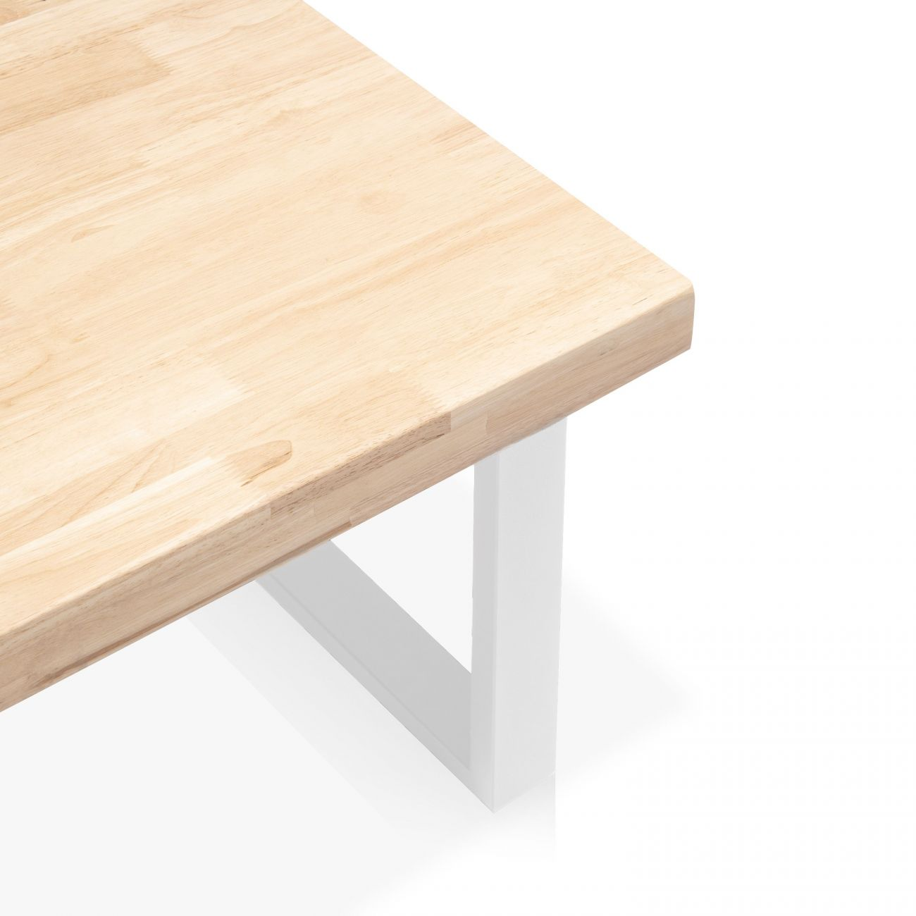 Tablero de madera con pata de metal blanca, primer plano.