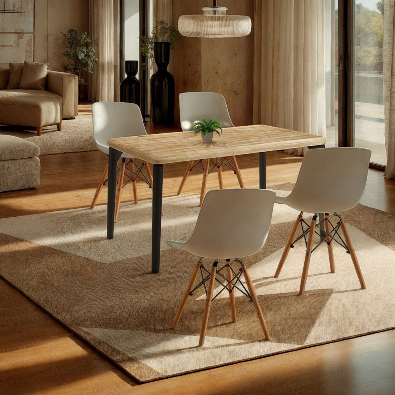 Comedor con mesa de madera, cuatro sillas blancas, sofá y alfombra.