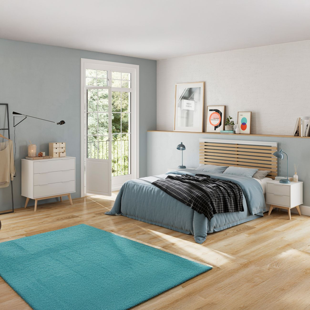 Un dormitorio luminoso con cama azul, muebles blancos y alfombra turquesa.