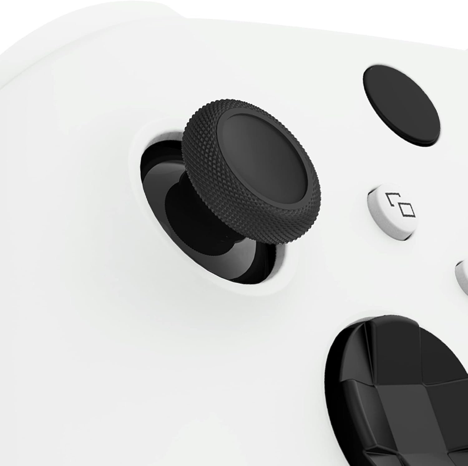 Nahaufnahme eines weißen Controllers mit schwarzem Joystick und Tasten.