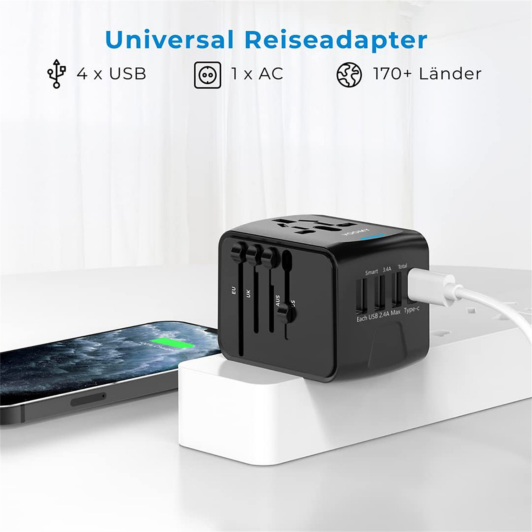 Schwarzer Reiseadapter mit 4 USB-Anschlüssen, 1 AC-Steckdose, lädt ein Handy.