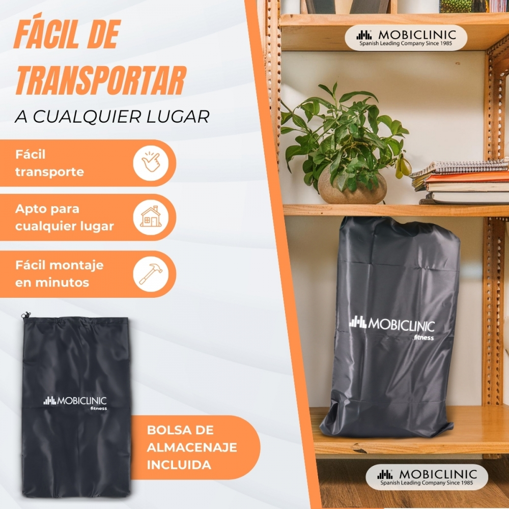Bolsa de transporte negra con logo MOBICLINIC en estante junto a planta.