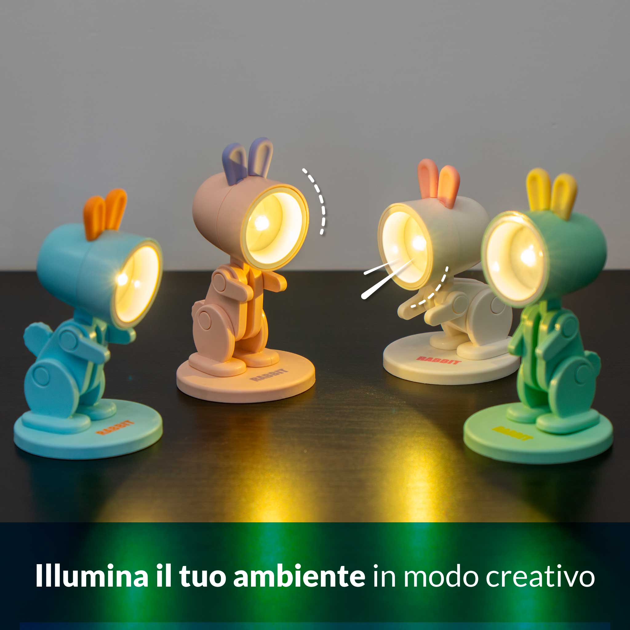 Quattro simpatiche lampade a coniglio blu, rosa, bianche e verdi brillano.