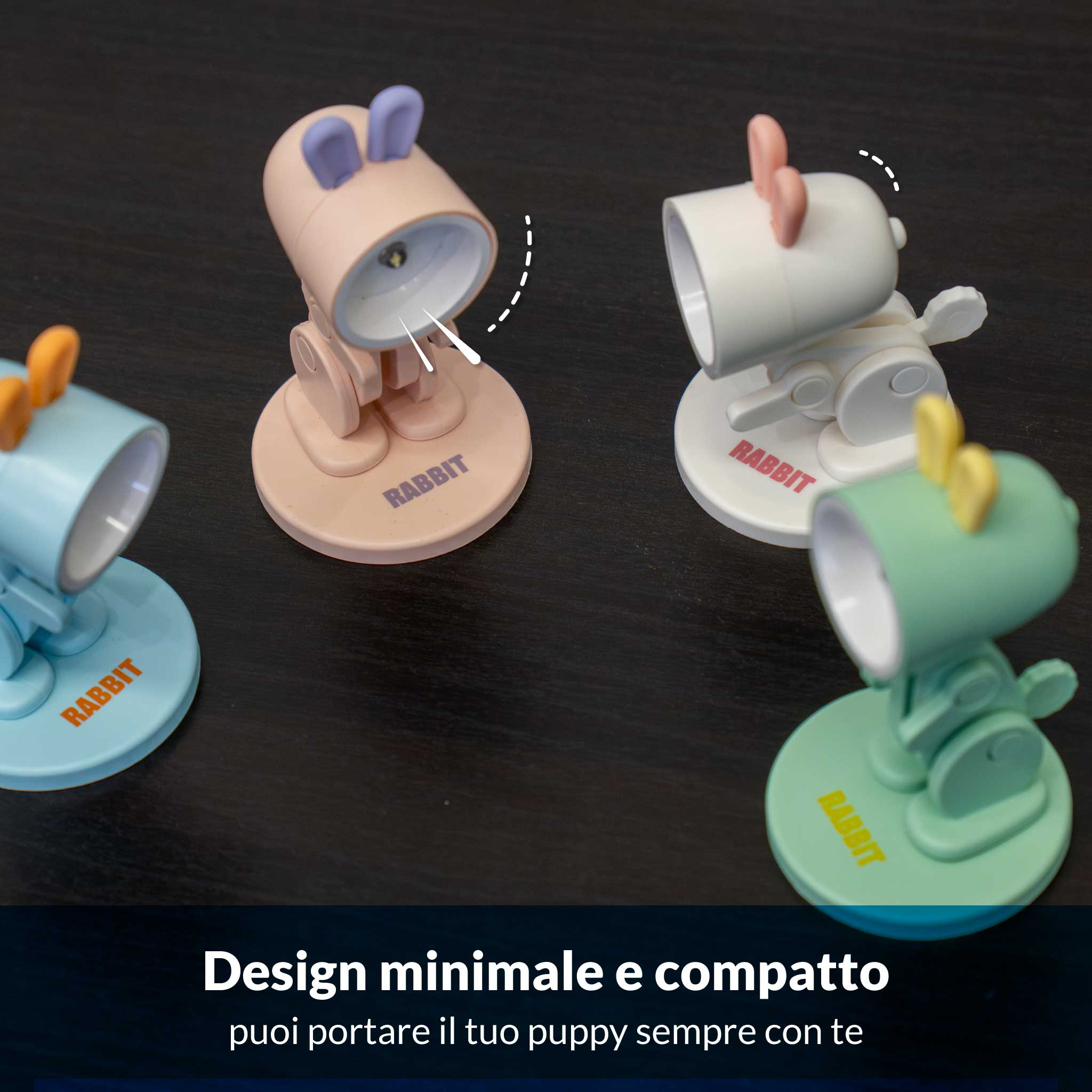 Quattro simpatiche lampade coniglietto blu, rosa, verdi e bianche su sfondo scuro.