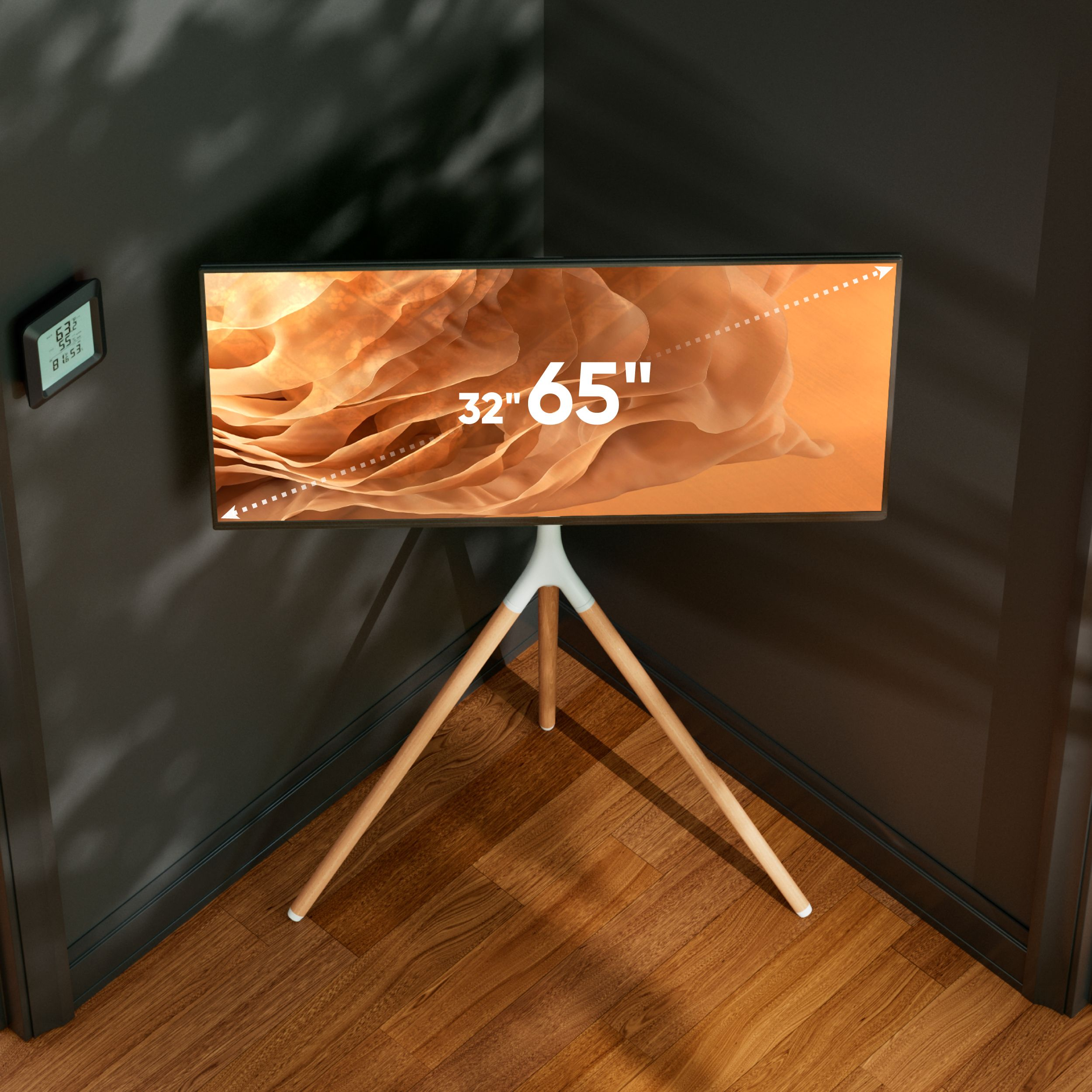 Telewizor 65 cali na statywie w ciemnym rogu.