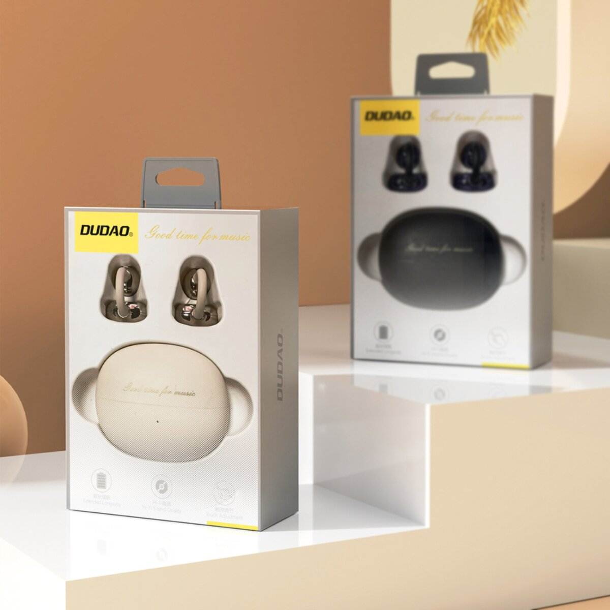 Due scatole di auricolari DUDAO con auricolari e custodia di ricarica.