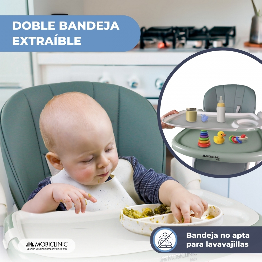 Un bebé come en una trona. Se muestra una doble bandeja extraíble.