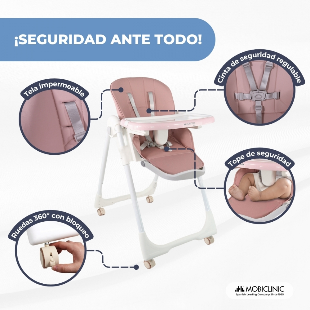 Se muestra una trona rosa con características de seguridad como cinturones y ruedas.
