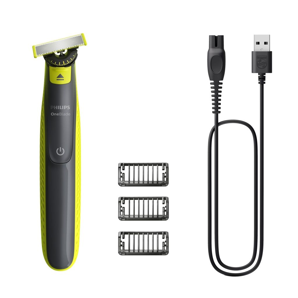 Beyaz arka planda şarj kablosu ve üç aparatlı Philips OneBlade düzeltici.