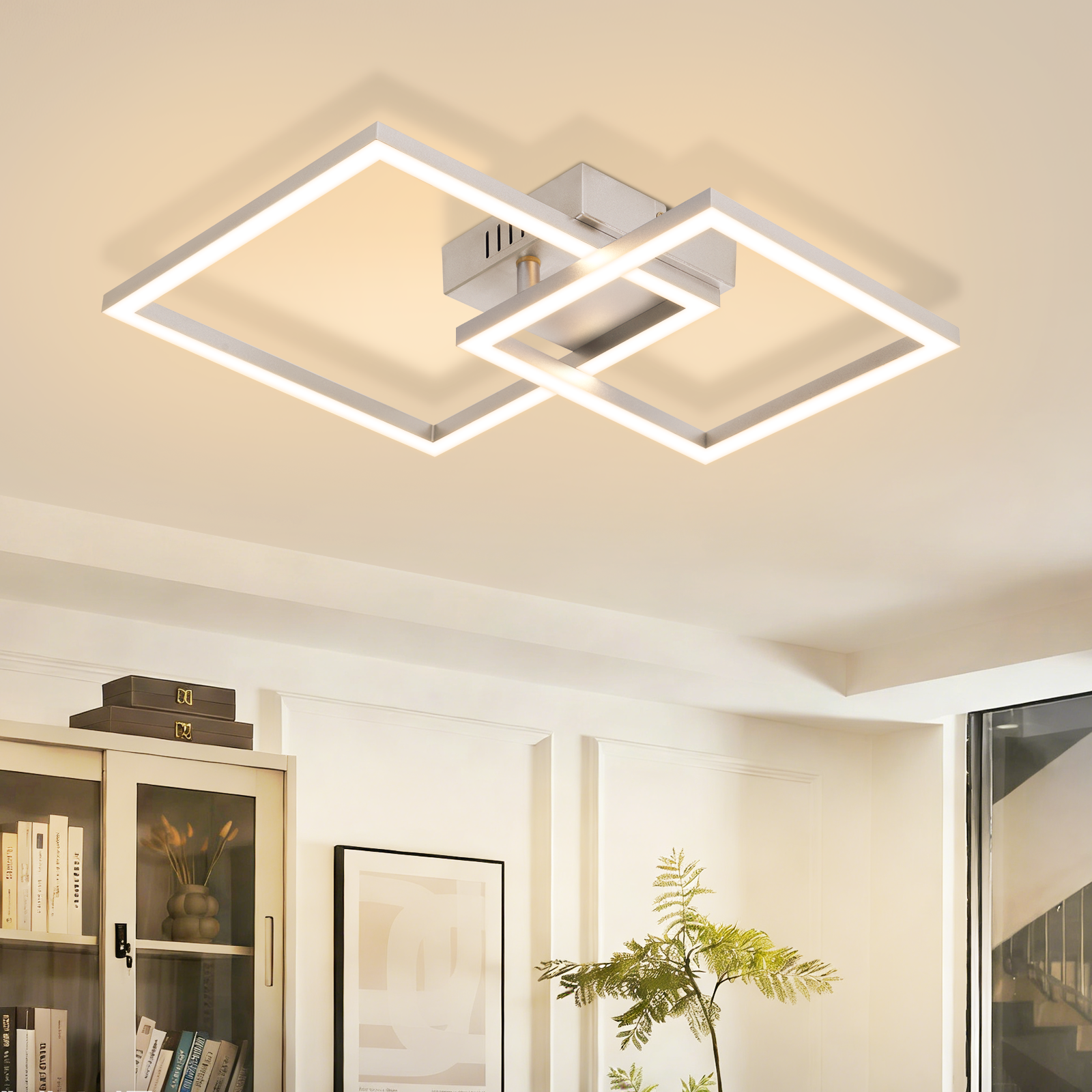 Plafoniera moderna con due quadrati annidati e illuminazione a LED.