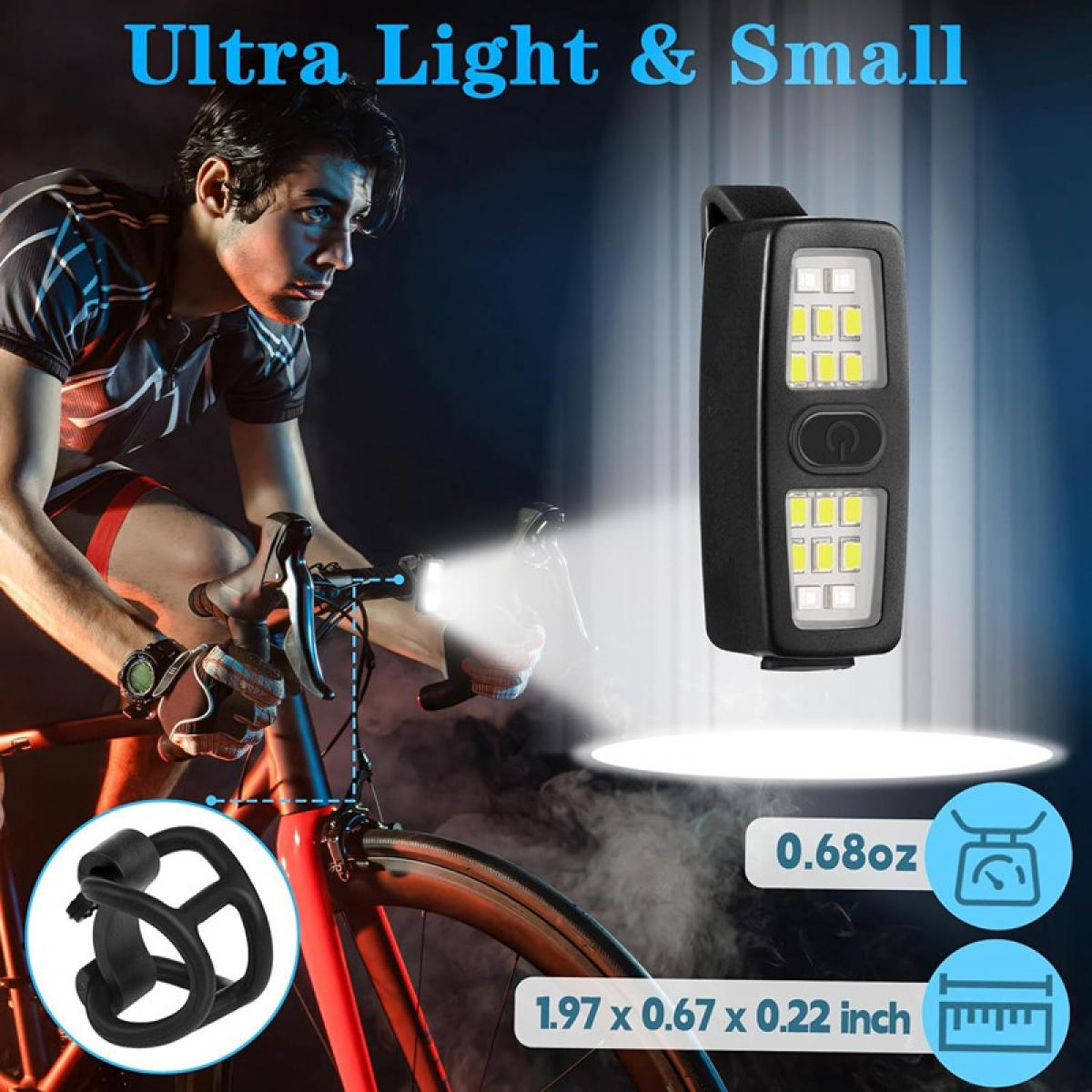 Ein Mann auf einem Fahrrad mit einer Lampe, die auf dem Lenker montiert ist.
