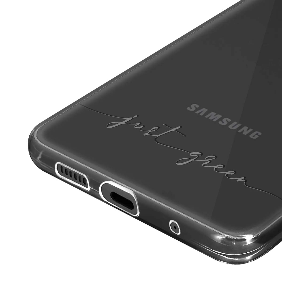 Primo piano di una custodia trasparente per telefono con "just green" e logo Samsung.