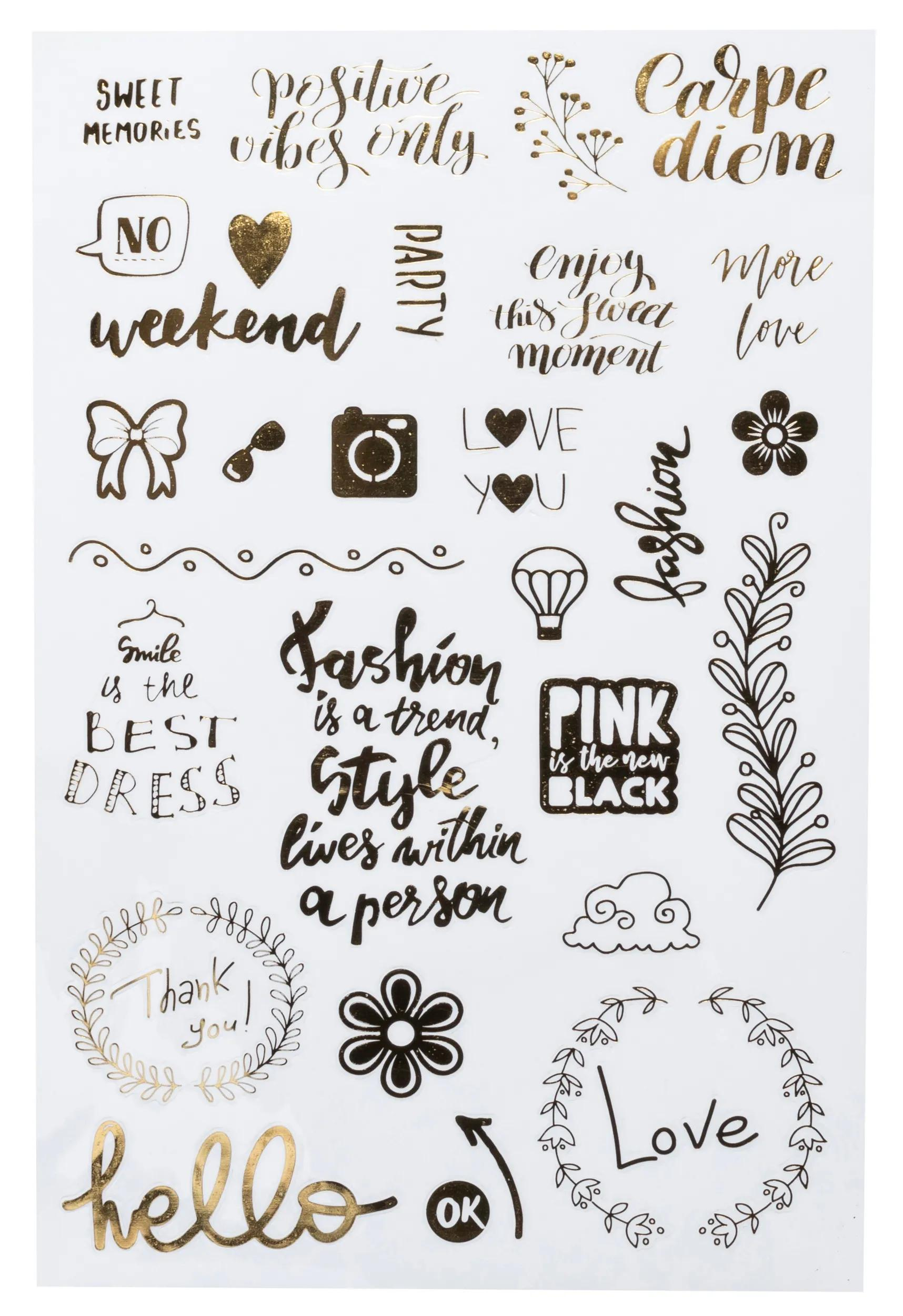 Pegatinas doradas con texto como 'Carpe Diem', 'Fashion' e imágenes.
