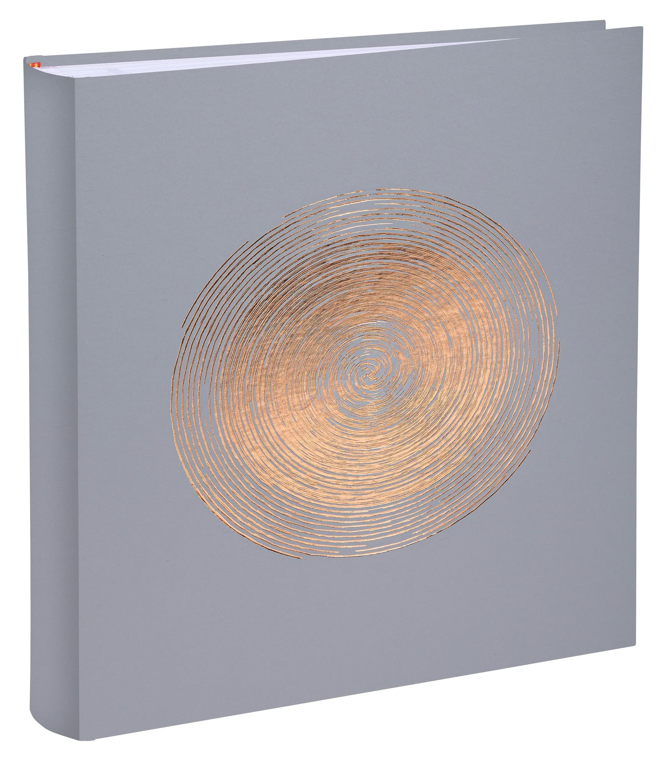 Libro gris con diseño de espiral de cobre en la portada.