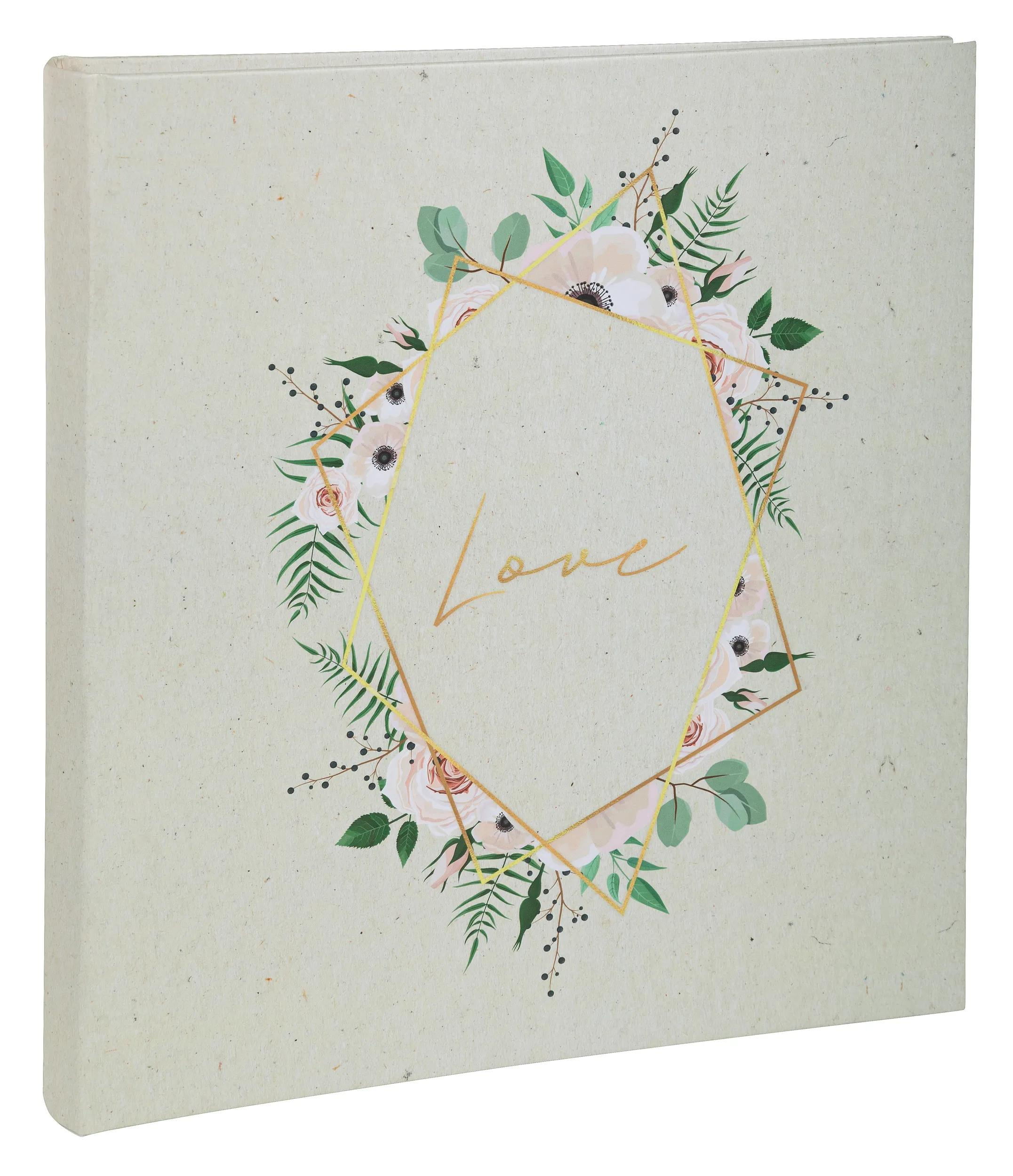 Un libro beige claro con corona floral y la palabra "Love".